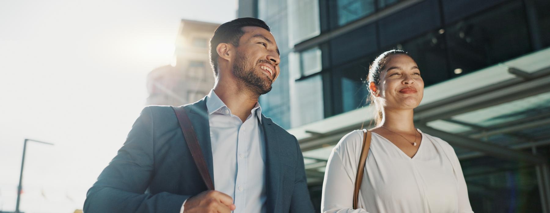 a man and a woman looking at a phone